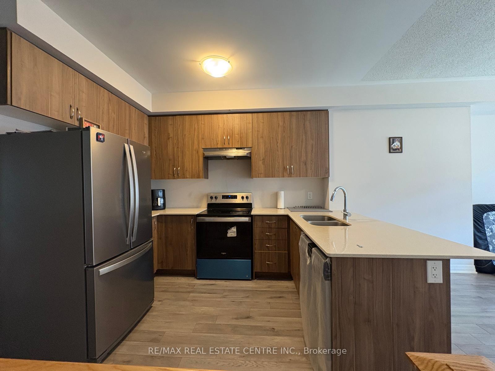 Photo 3 of Unit 304, 585 Colborne Street E, Brantford, East Ward — HOMEH