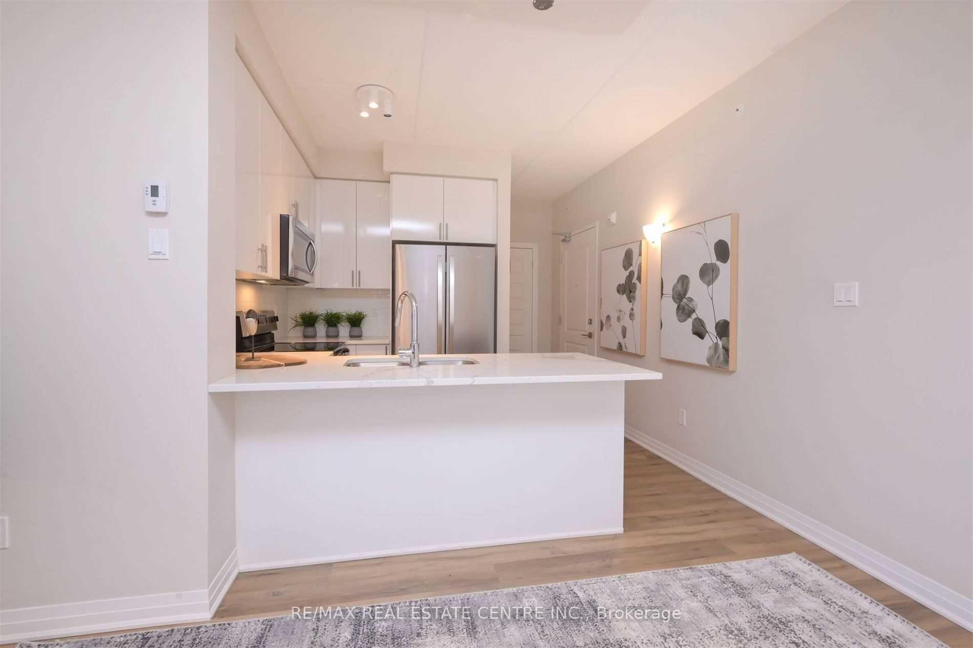 Photo 9 of Unit 102, 610 Farmstead Drive, Milton, Willmott — HOMEH