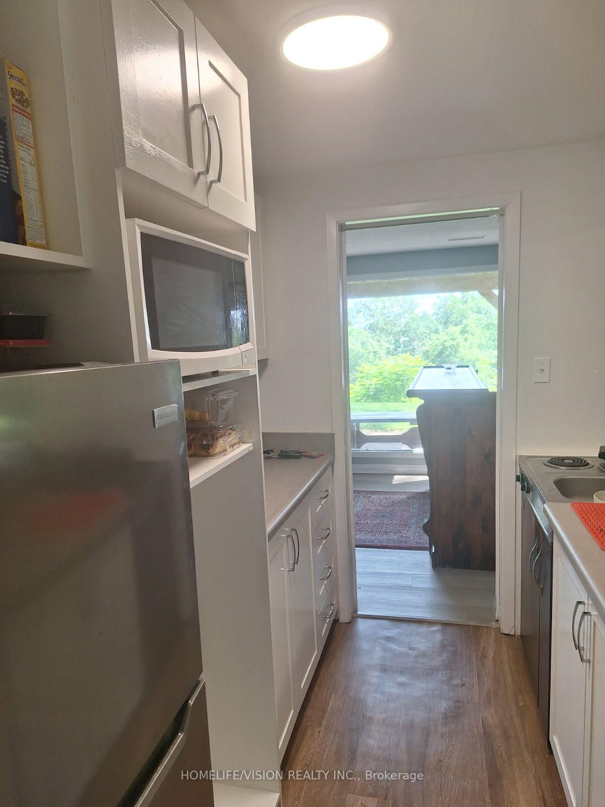 Front of Unit Basement, 161 Shanty Bay Road