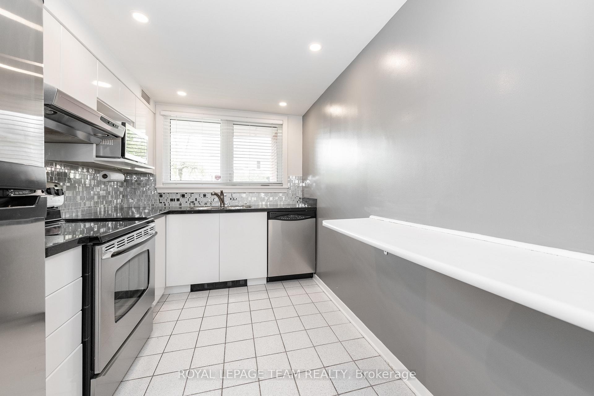 Photo 3 of Unit 105, 939 North River Road, Ottawa, Overbrook — HOMEH