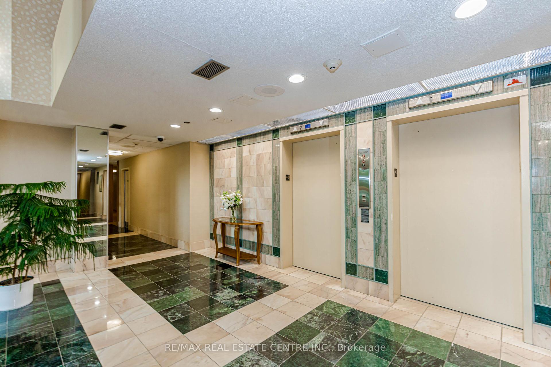 Photo 5 of Unit 104, 310 Mill Street S, Brampton, Brampton South — HOMEH
