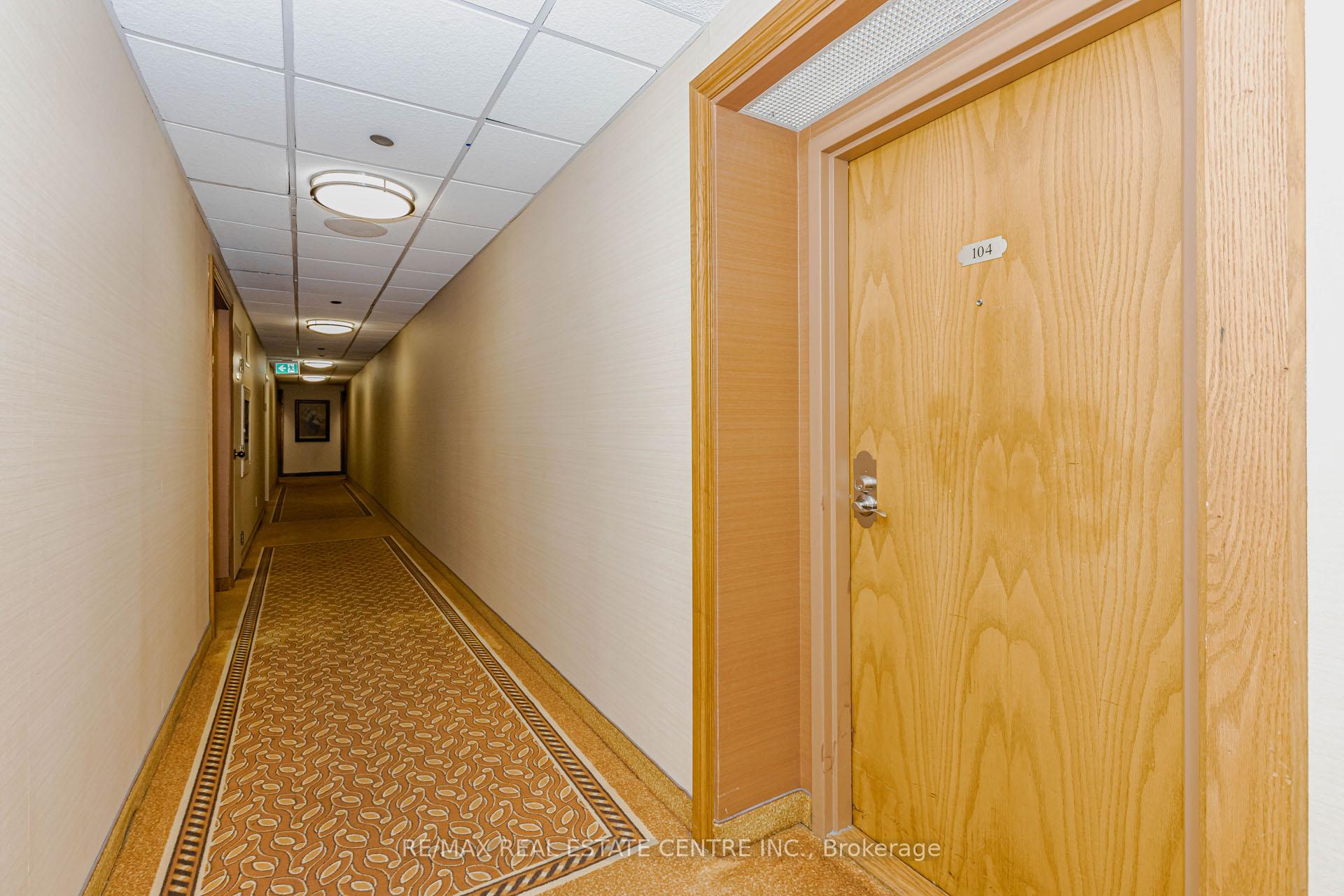 Photo 7 of Unit 104, 310 Mill Street S, Brampton, Brampton South — HOMEH