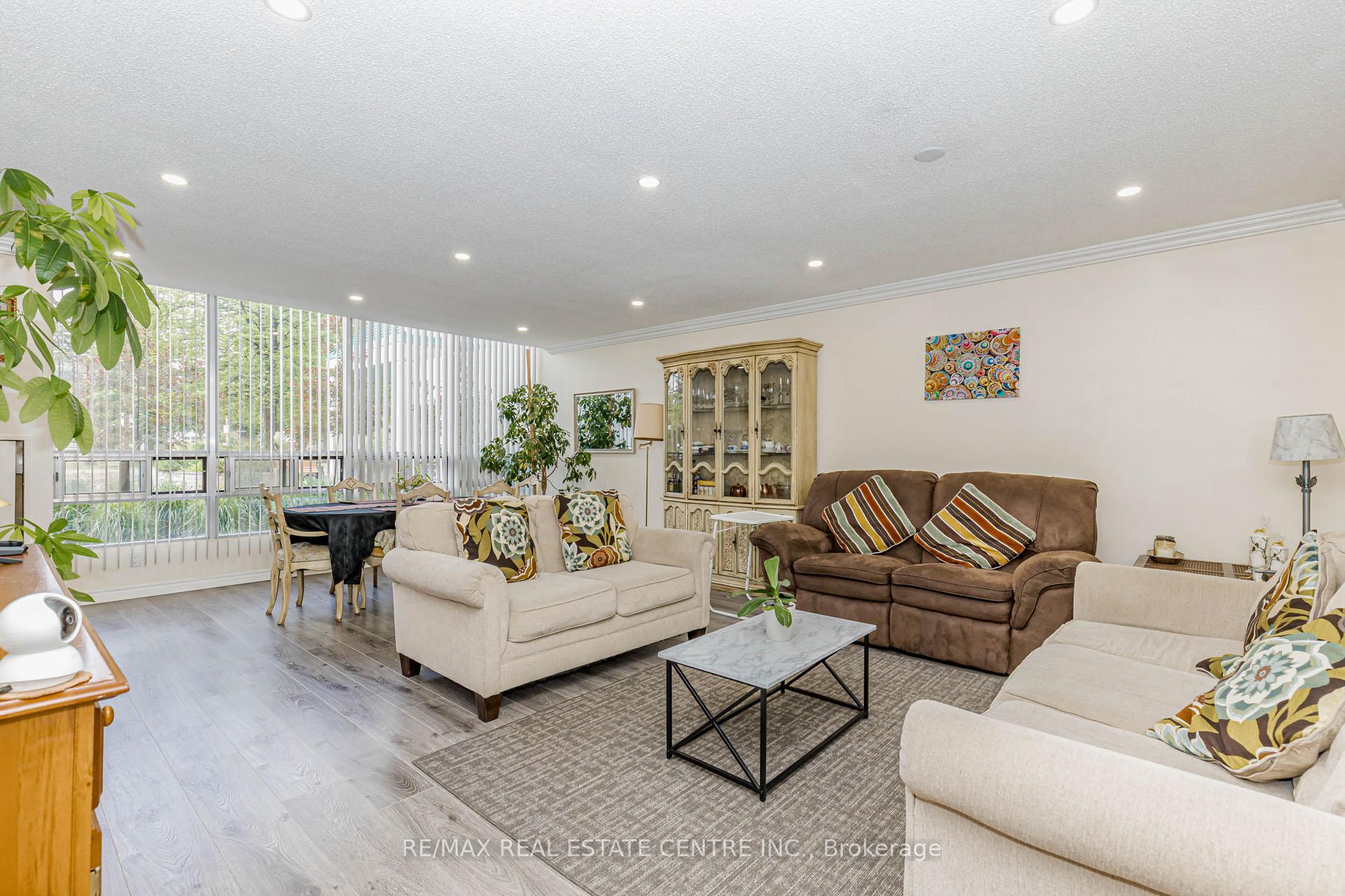 Photo 9 of Unit 104, 310 Mill Street S, Brampton, Brampton South — HOMEH