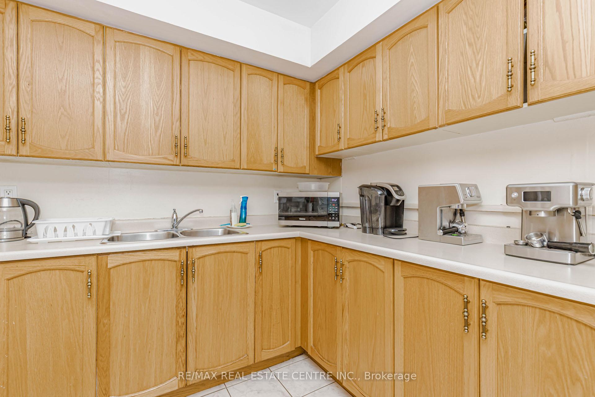 Photo 12 of Unit 104, 310 Mill Street S, Brampton, Brampton South — HOMEH