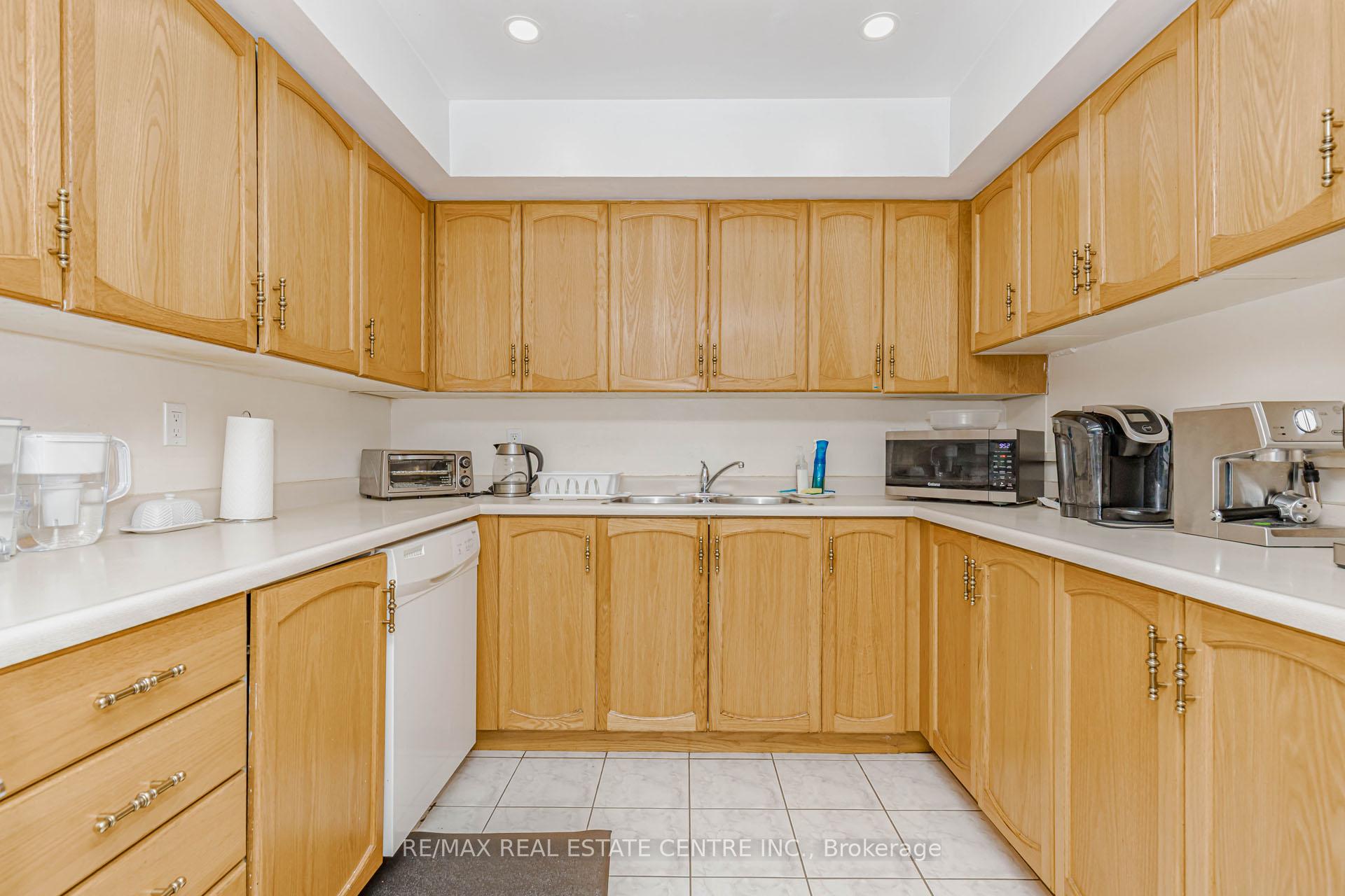 Photo 13 of Unit 104, 310 Mill Street S, Brampton, Brampton South — HOMEH