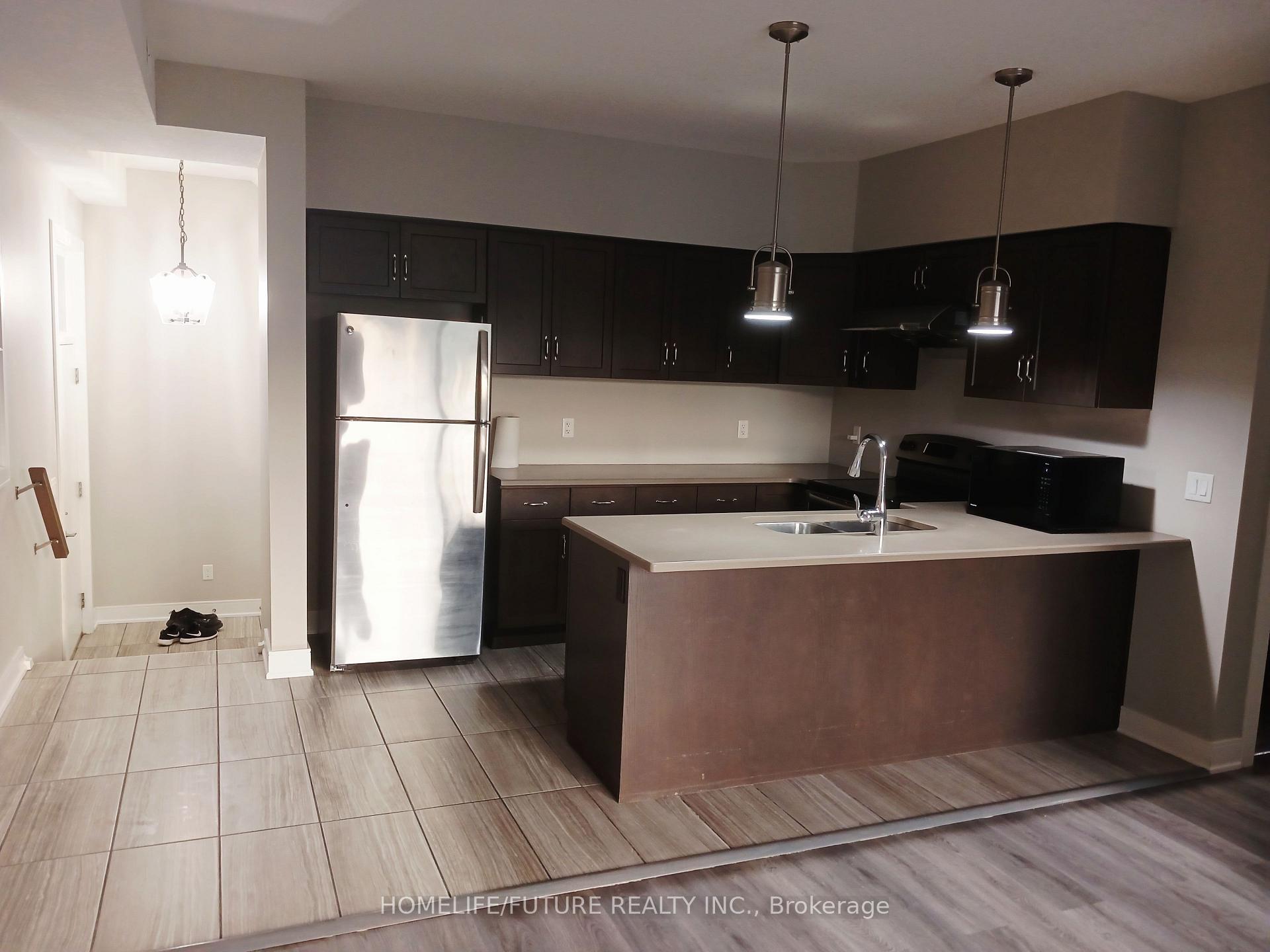Photo 6 of Unit 18, 32 Arkell Road, Guelph, Kortright East — HOMEH
