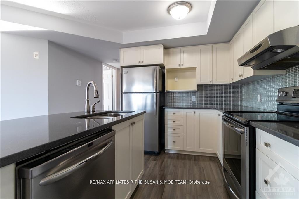 Photo 5 of Unit 8, 565 Stonefield Private, Ottawa, Barrhaven East — HOMEH