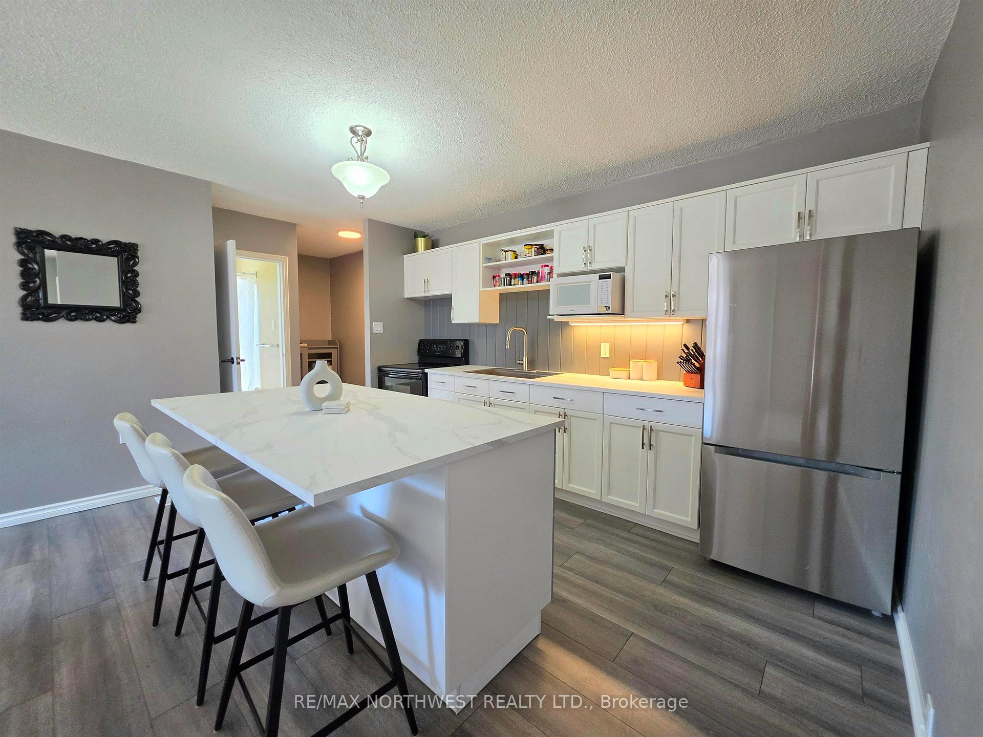 Photo 11 of 310 Trojan Street, Kenora, Ride Out — HOMEH