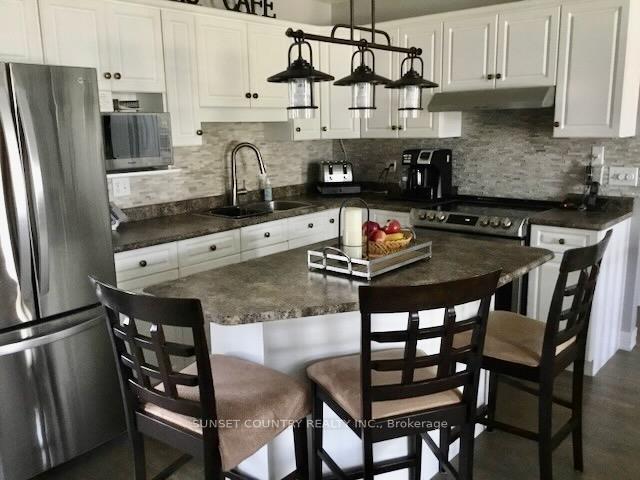 Photo 10 of 41 Clearwater Crescent, Dryden, Pronger Park — HOMEH