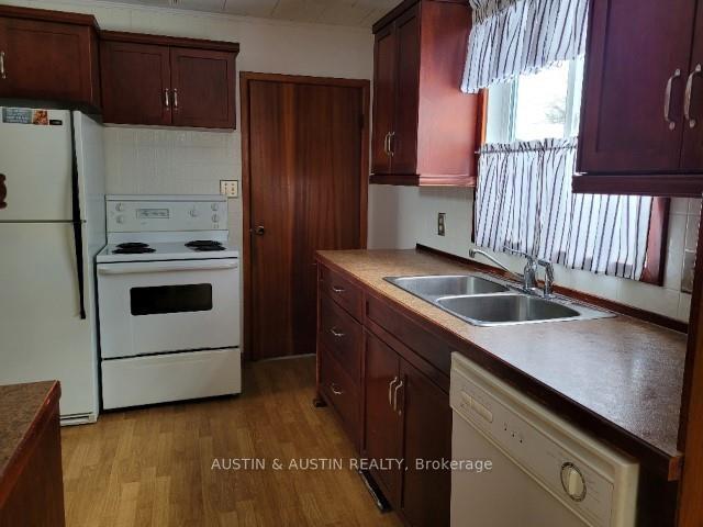Photo 3 of 15 Park Crescent, Dryden, Milestone — HOMEH