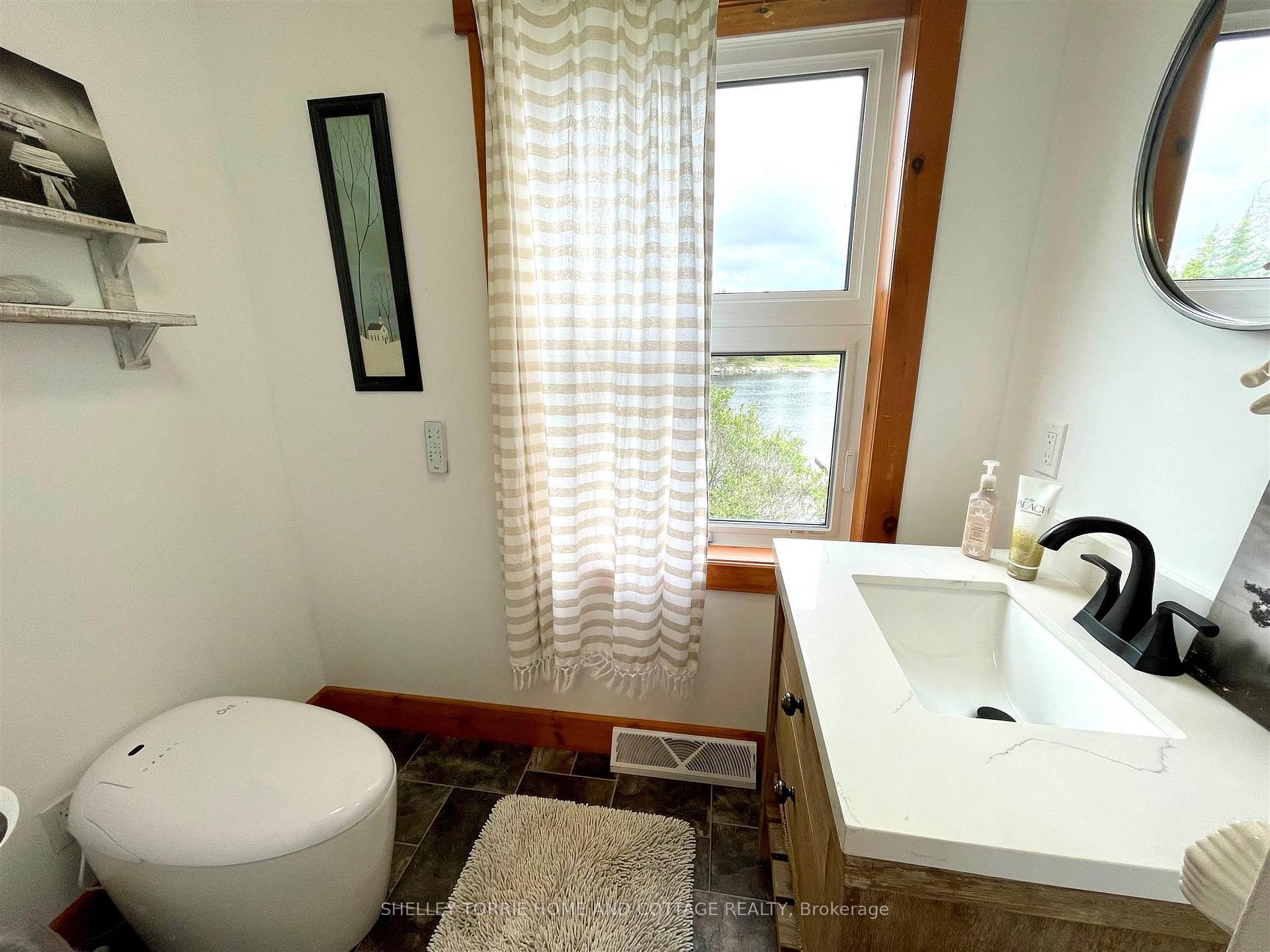 Photo 12 of 61 Peterson Drive, Kenora, Keewatin — HOMEH