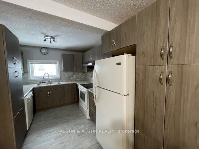 Photo 2 of 93 St. Charles Street, Dryden, Milestone — HOMEH