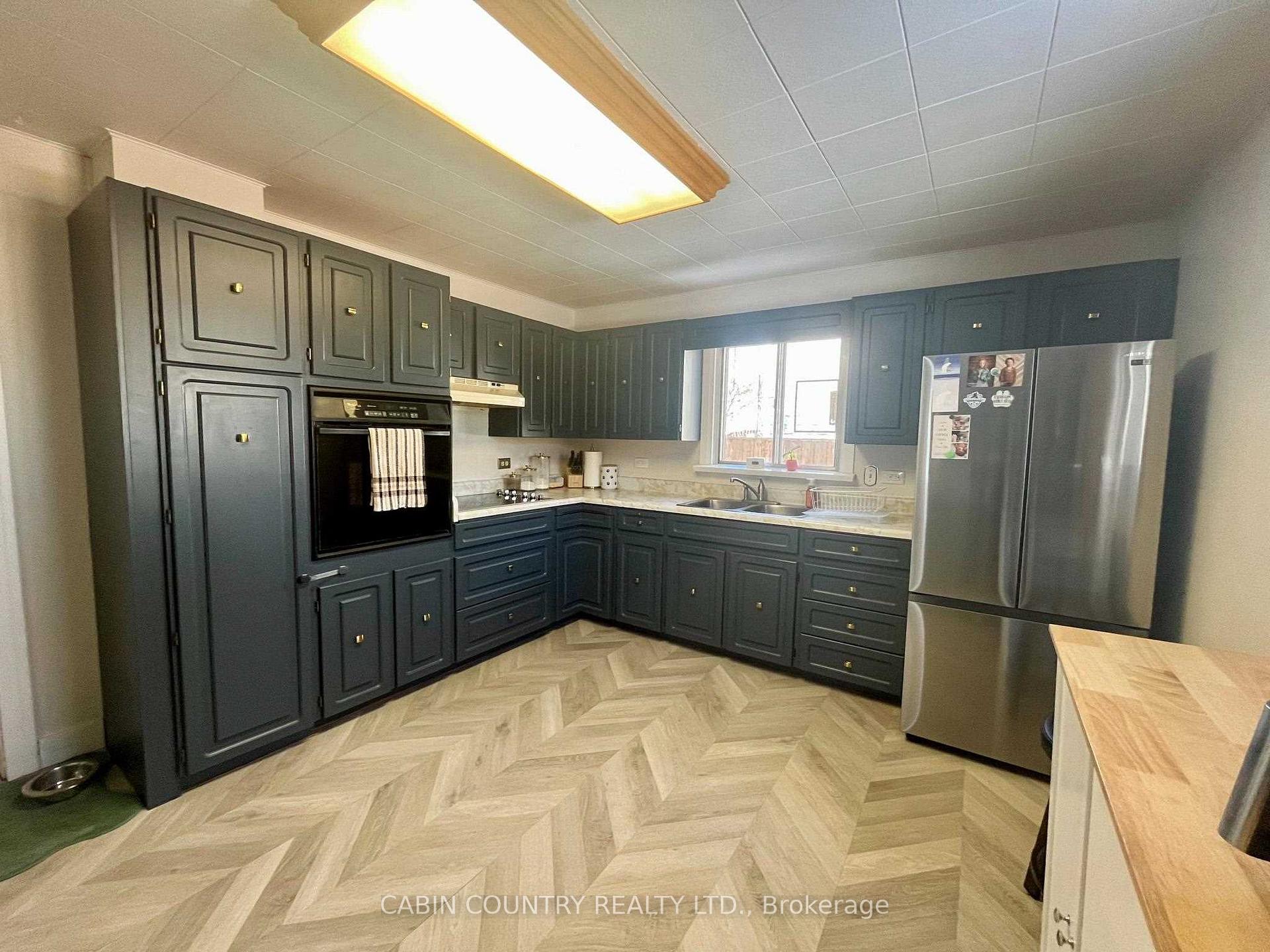 Photo 19 of 425 River Street, Kenora, Keewatin — HOMEH