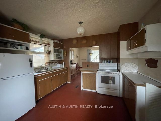 Photo 2 of 99 Casimir Avenue, Dryden, Milestone — HOMEH
