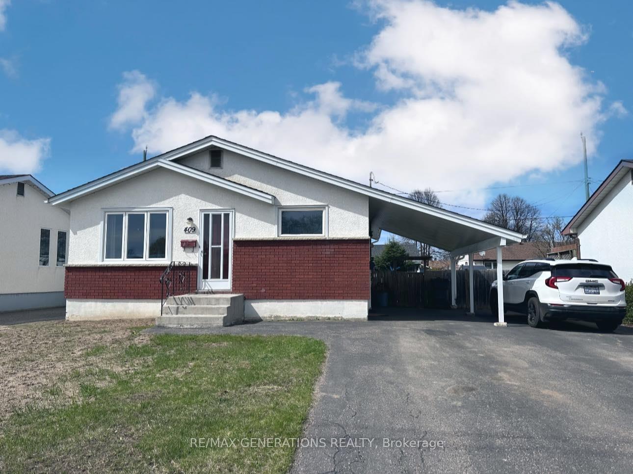 Front of 409 Churchill Drive W
