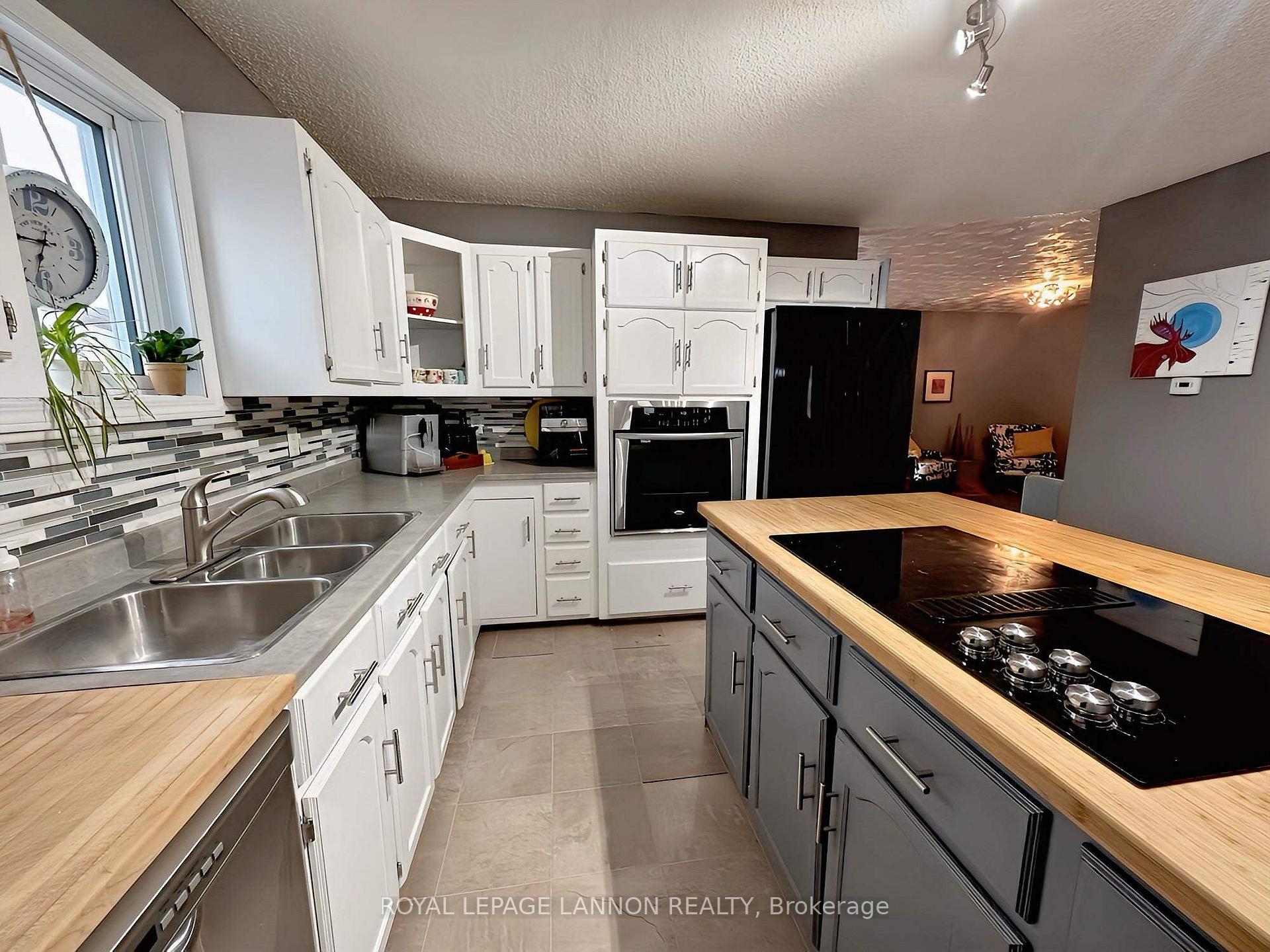 Photo 4 of 213 Third Avenue SE, Greenstone — HOMEH