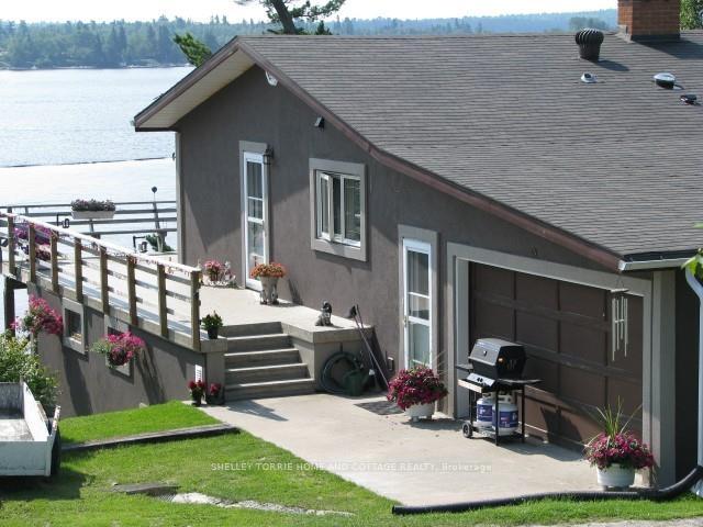 Photo 3 of 411 Lakeview Drive, Kenora, Norman — HOMEH