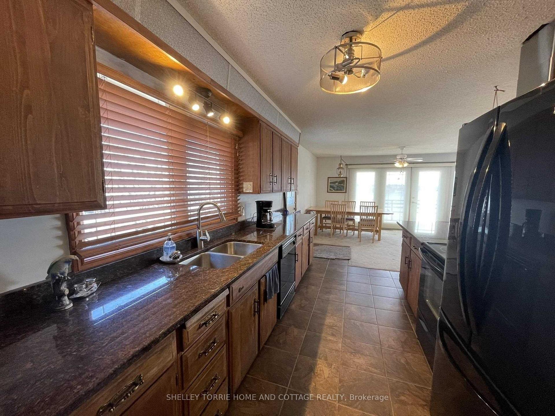 Photo 9 of 411 Lakeview Drive, Kenora, Norman — HOMEH