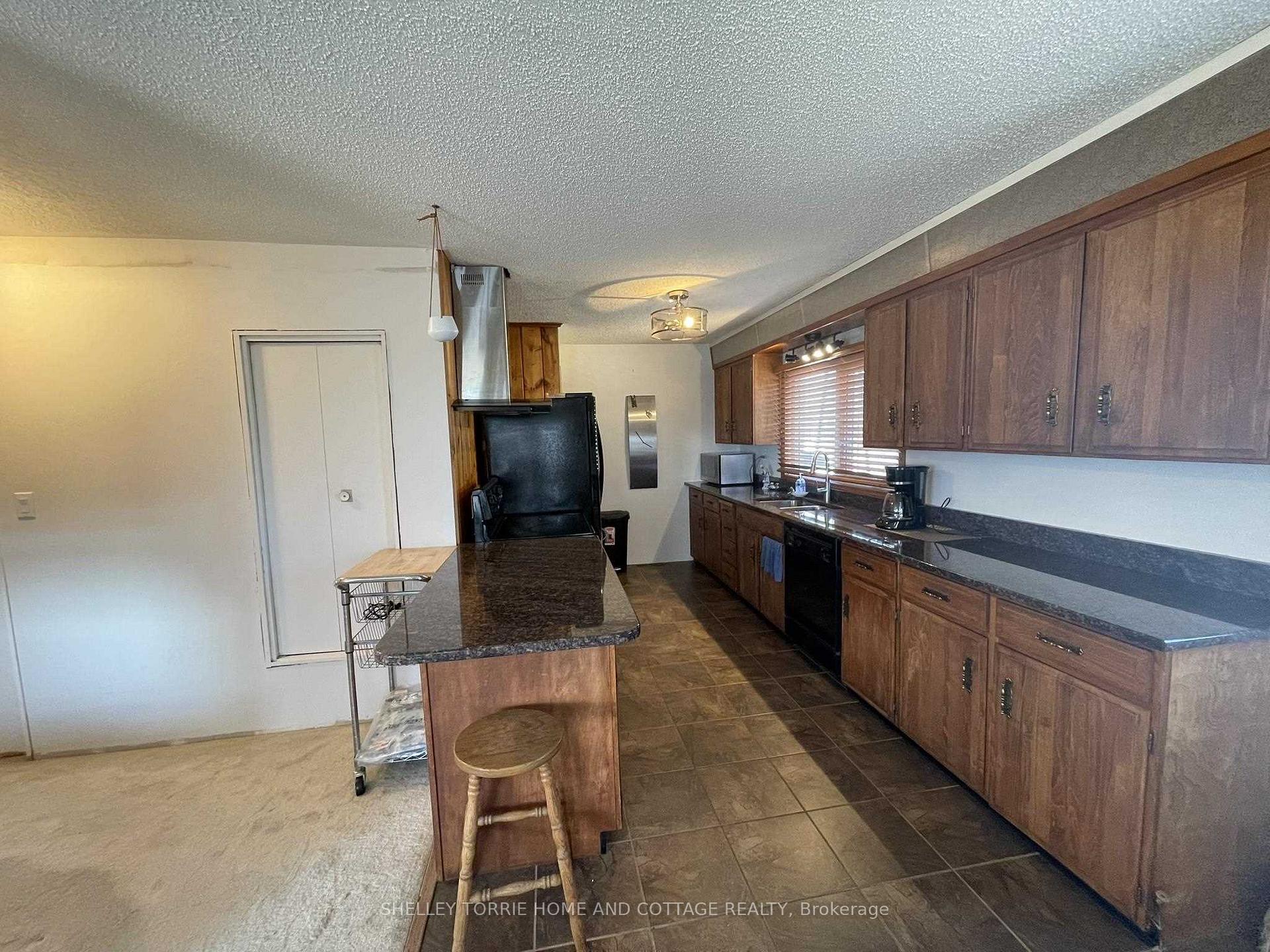 Photo 10 of 411 Lakeview Drive, Kenora, Norman — HOMEH