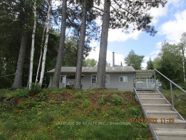 Front of 310 Wenasaga Lk Road S