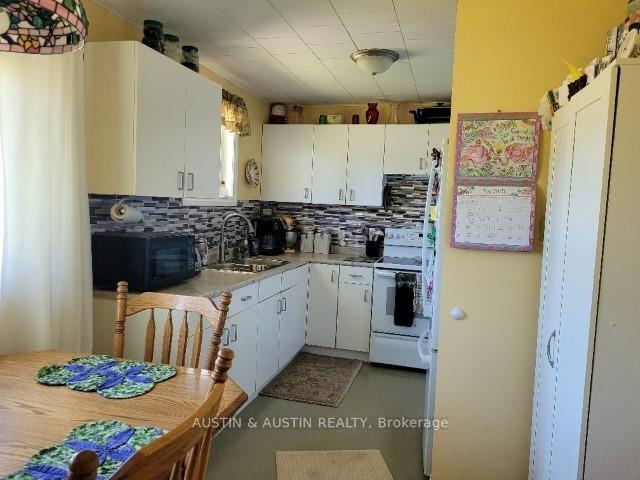 Photo 2 of 510 594, Machin — HOMEH