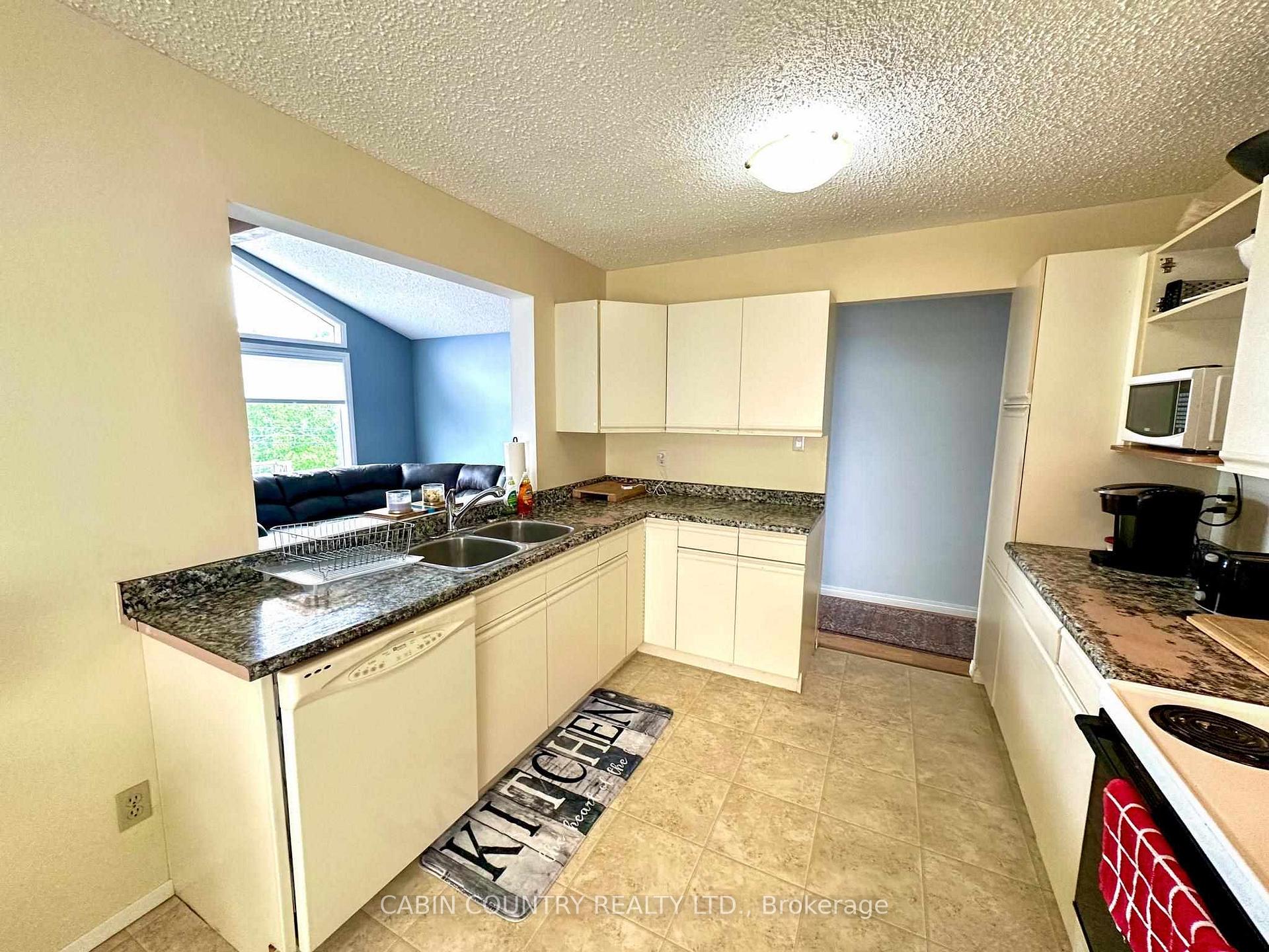Photo 18 of 706 Beach Road, Kenora, Keewatin — HOMEH