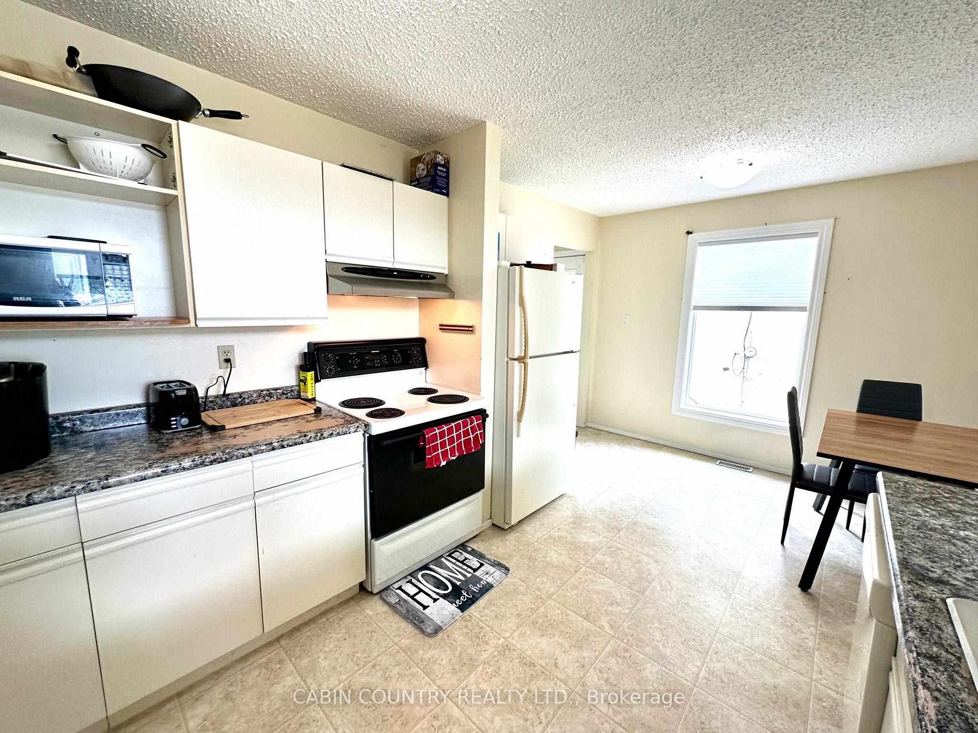 Photo 19 of 706 Beach Road, Kenora, Keewatin — HOMEH