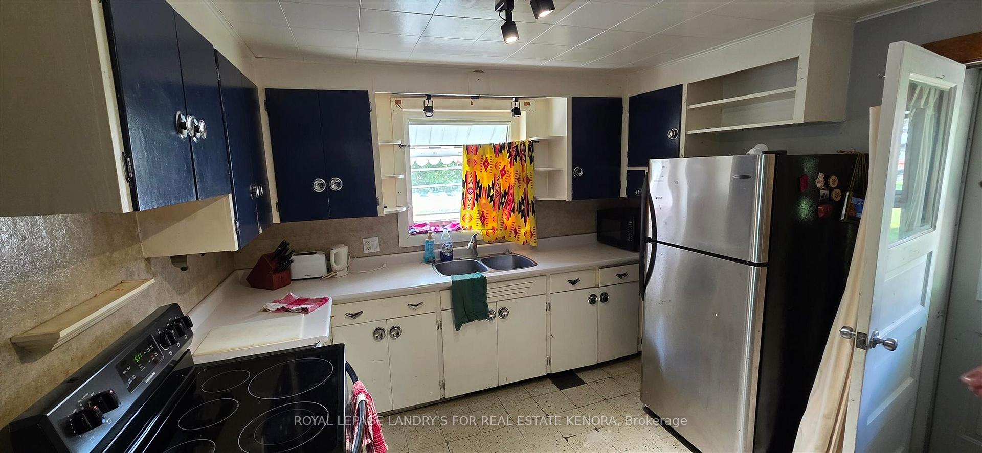 Photo 2 of 512 Third Street N, Kenora, North End — HOMEH