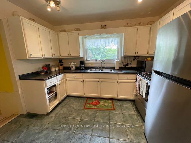 Photo 2 of 321 Boozhoo Avenue, Dryden, Government Road — HOMEH