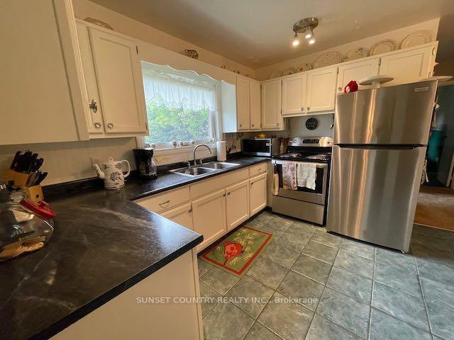Photo 4 of 321 Boozhoo Avenue, Dryden, Government Road — HOMEH