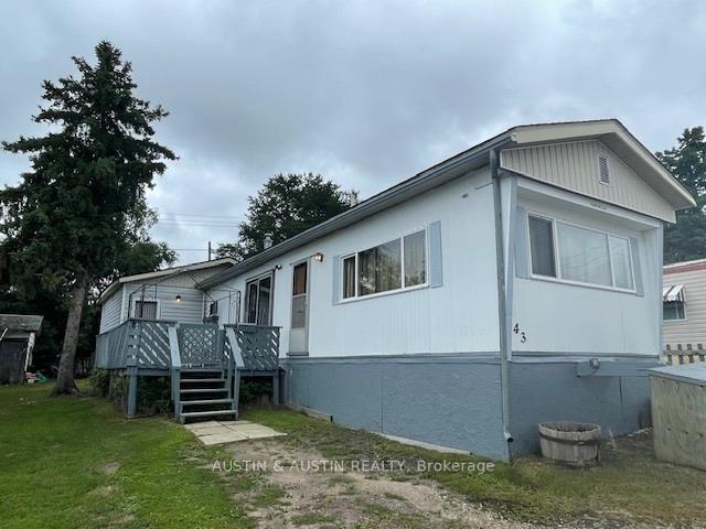 Photo 1 of 43 Wilson Trailer Park, Dryden, Milestone — HOMEH