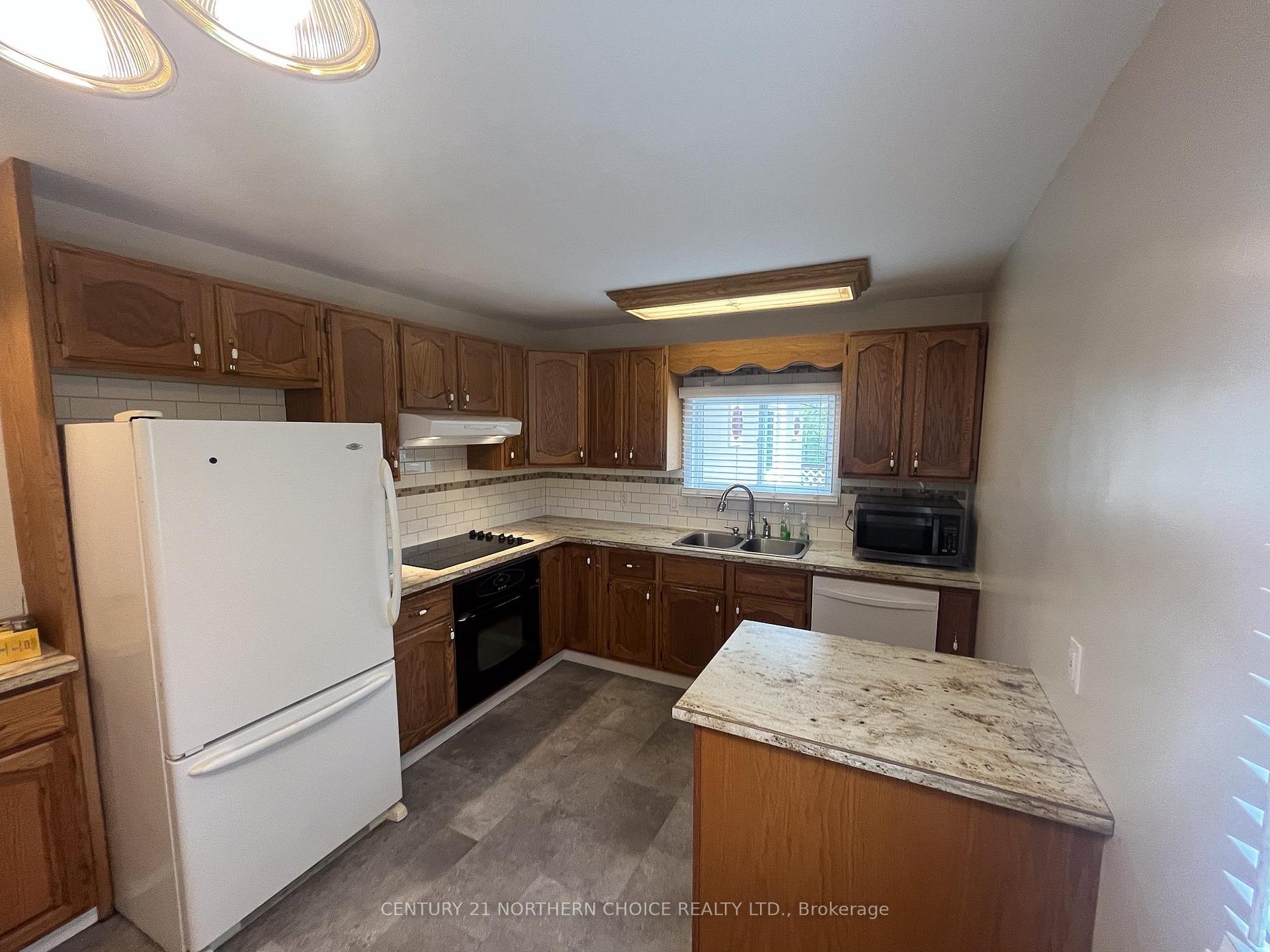 Photo 5 of 323 Tenth Street, Kenora, Keewatin — HOMEH