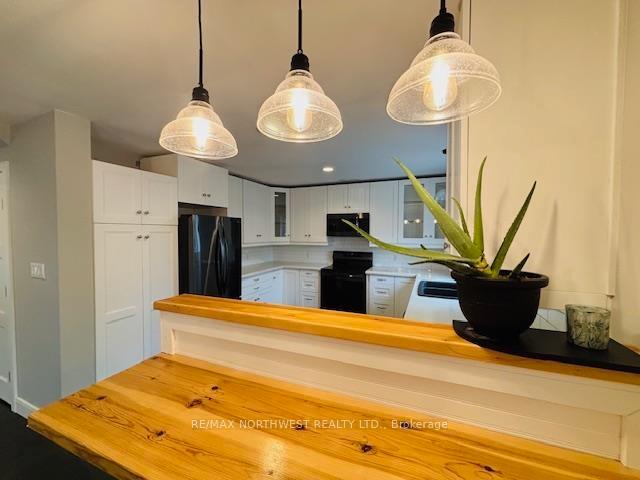 Photo 13 of 915 Eleventh Ave N, Kenora, Evergreen — HOMEH