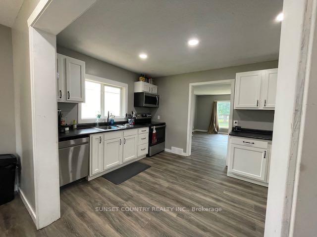 Photo 3 of 211 St. Charles Street, Dryden, Milestone — HOMEH