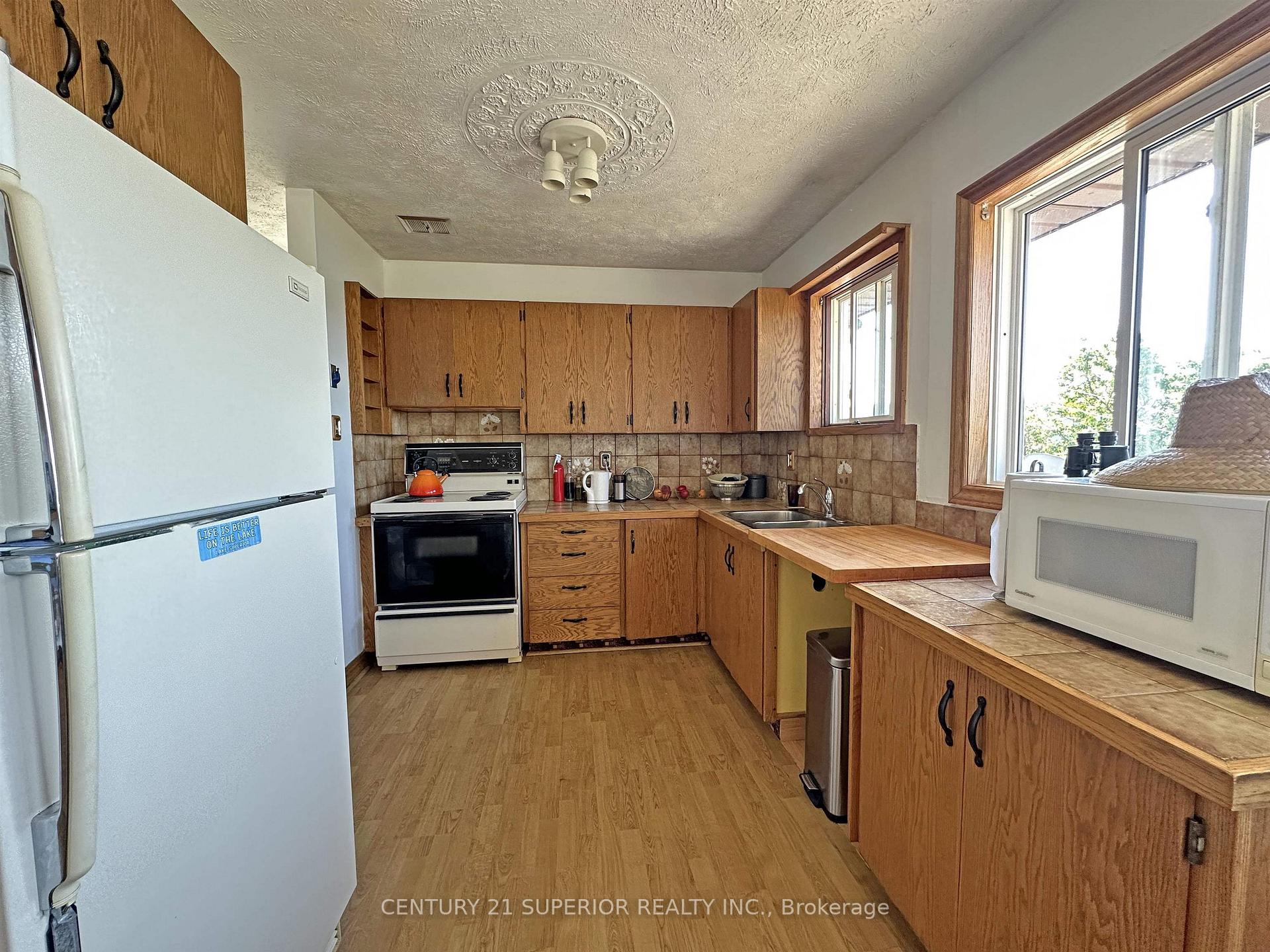 Photo 8 of 213 & 215 Main Street, Thunder Bay Remote Area — HOMEH