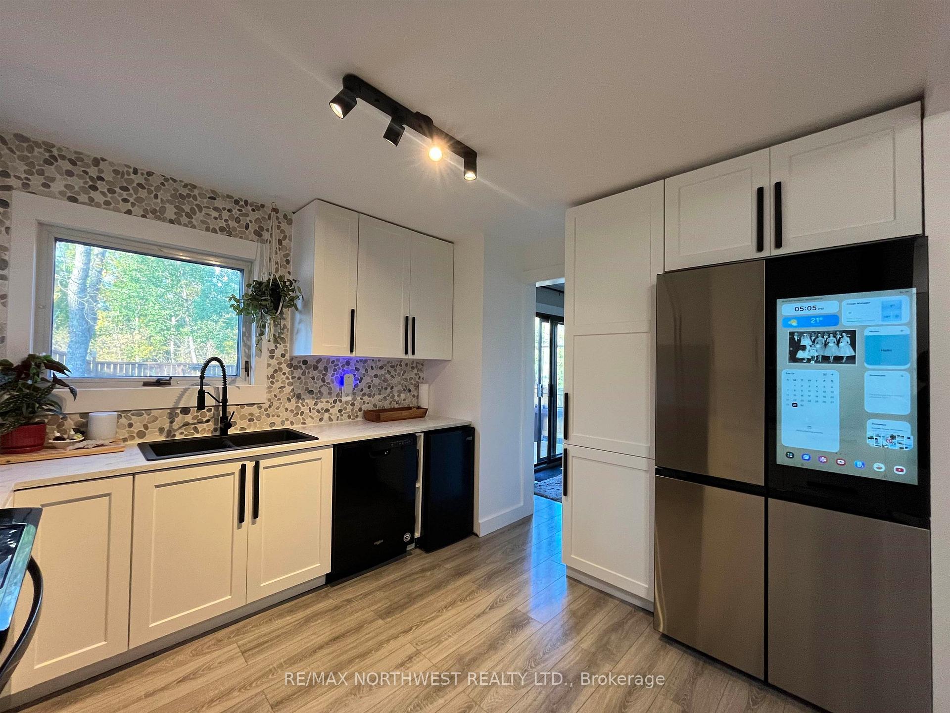 Photo 2 of 132 Minto Crescent, Kenora, Amethyst — HOMEH