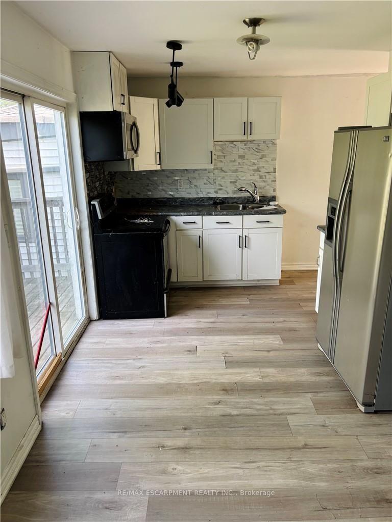 Photo 2 of 218 East 8th Street, Hamilton, Centremount — HOMEH
