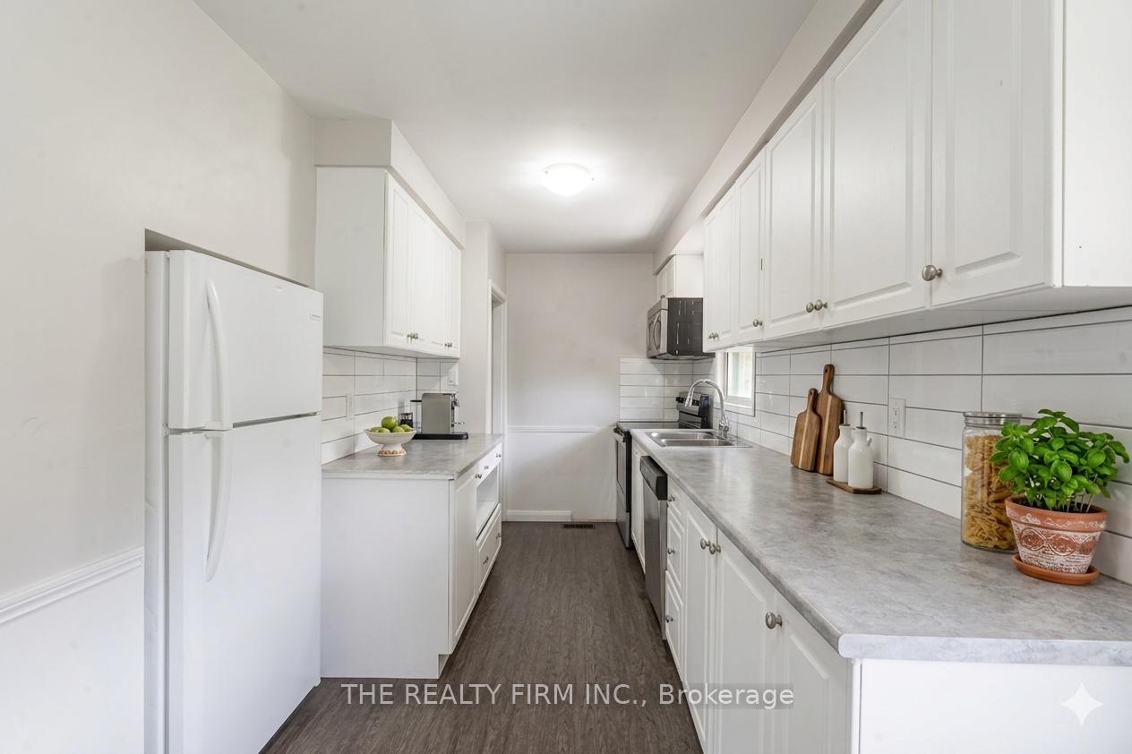 Photo 9 of 348 Winnipeg Boulevard, London, East H — HOMEH