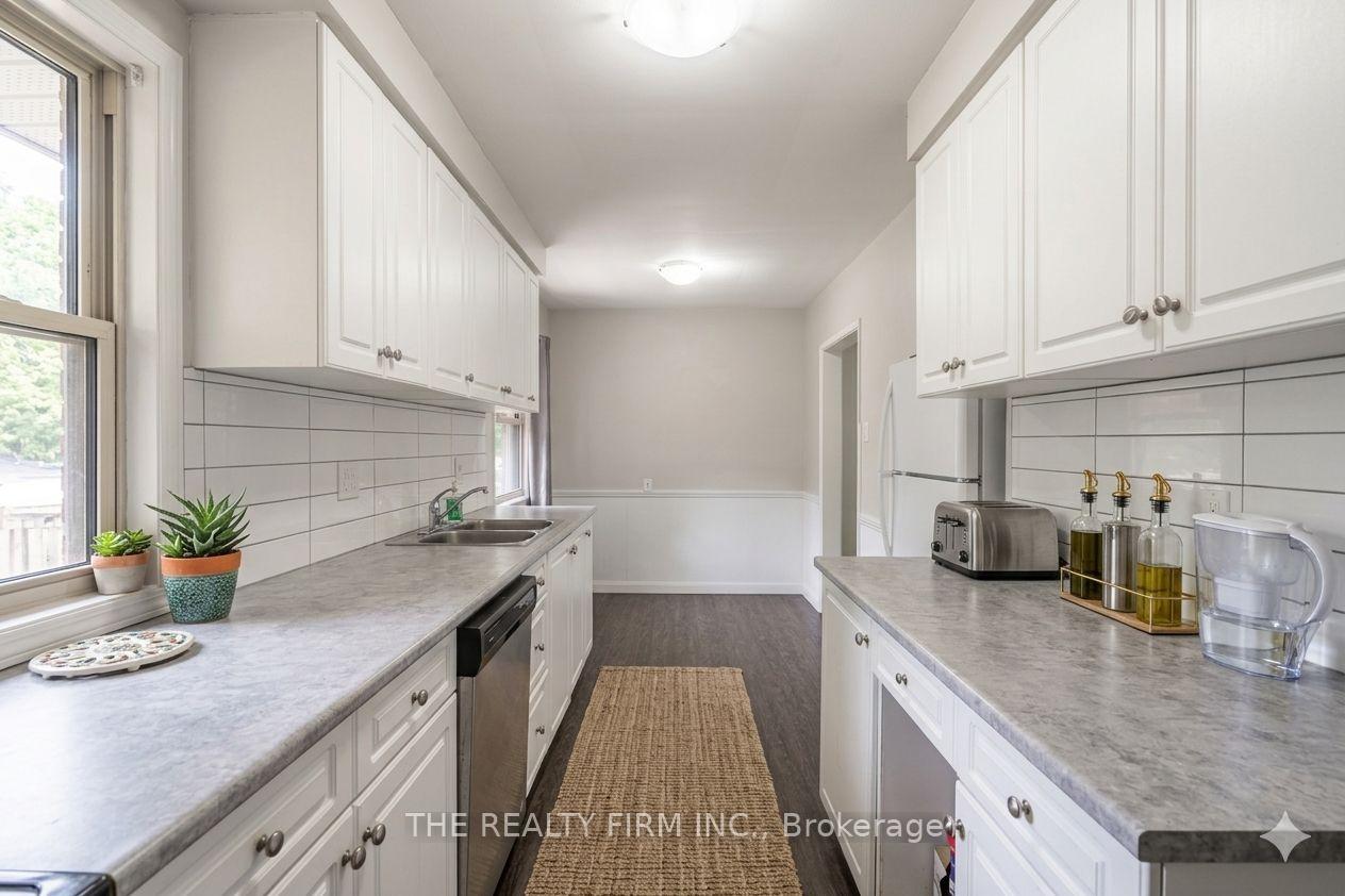 Photo 11 of 348 Winnipeg Boulevard, London, East H — HOMEH