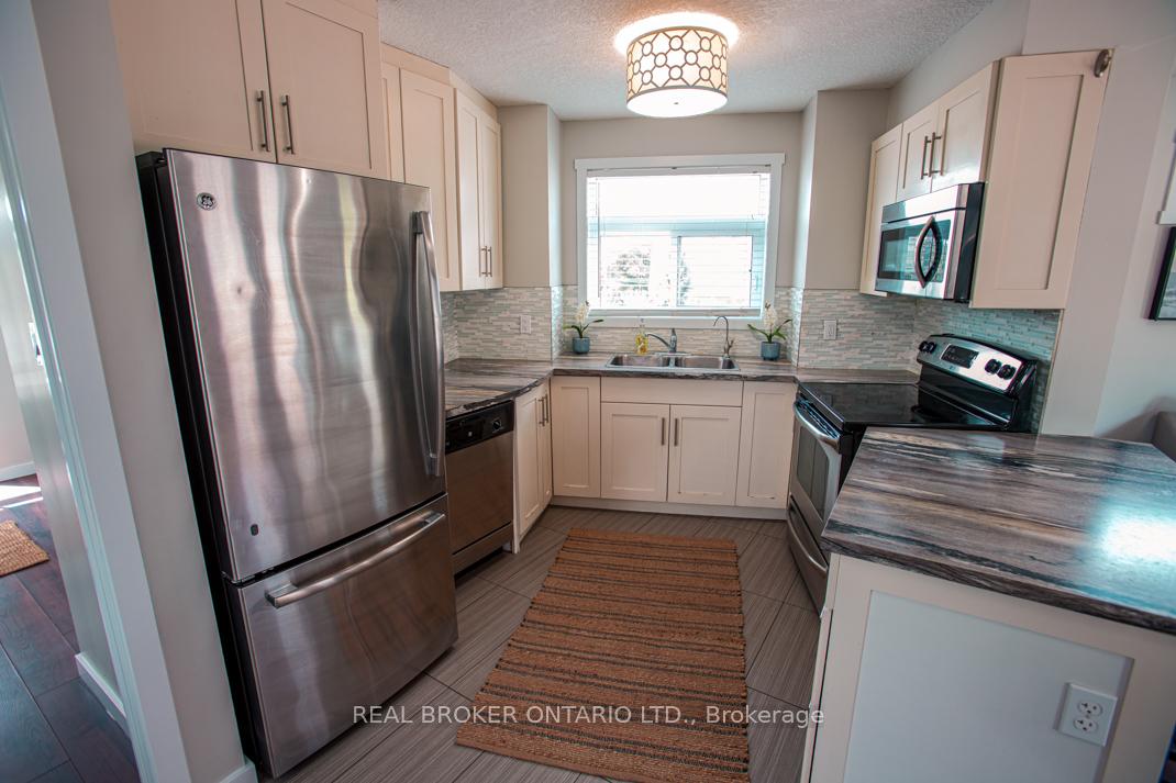 Photo 10 of Unit B, 489 East Avenue, Kitchener, King East — HOMEH