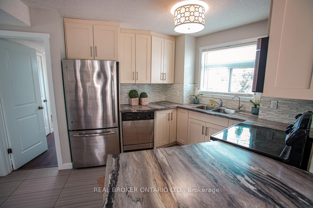 Photo 11 of Unit B, 489 East Avenue, Kitchener, King East — HOMEH