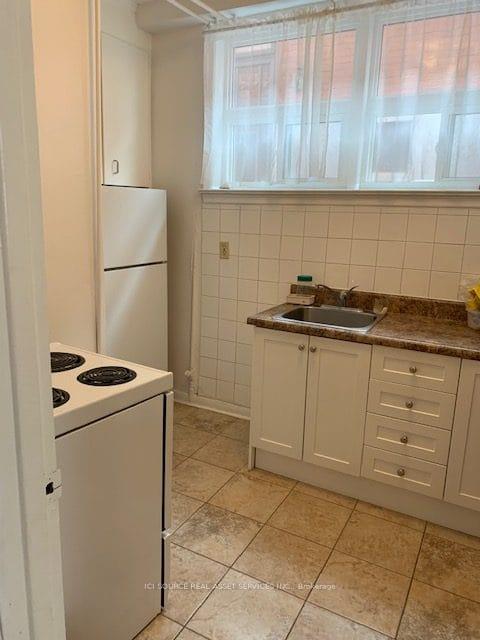 Photo 4 of Unit 1, 53 Kirknewton Road, Toronto, Caledonia-Fairbank — HOMEH