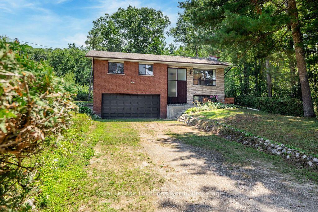 Photo 1 of 1928 Champlain Road, Tiny, Rural Tiny — HOMEH