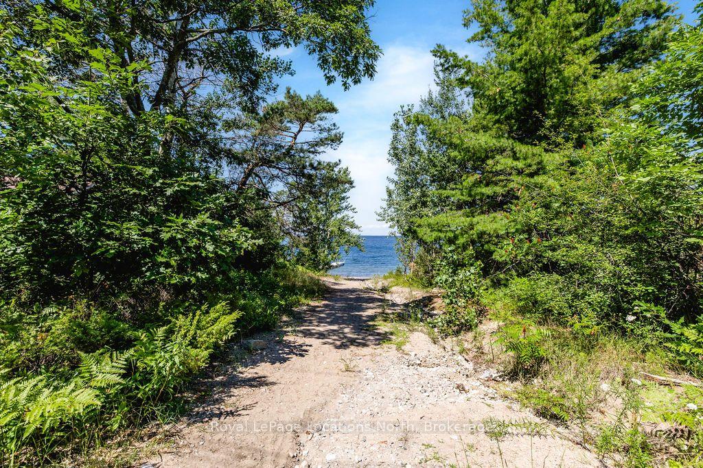 Photo 40 of 1928 Champlain Road, Tiny, Rural Tiny — HOMEH
