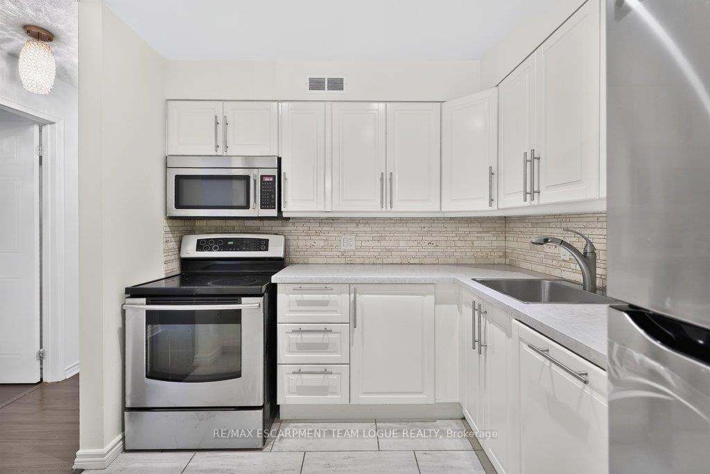 Photo 9 of Unit 1531, 1482 Pilgrims Way, Oakville, Glen Abbey — HOMEH