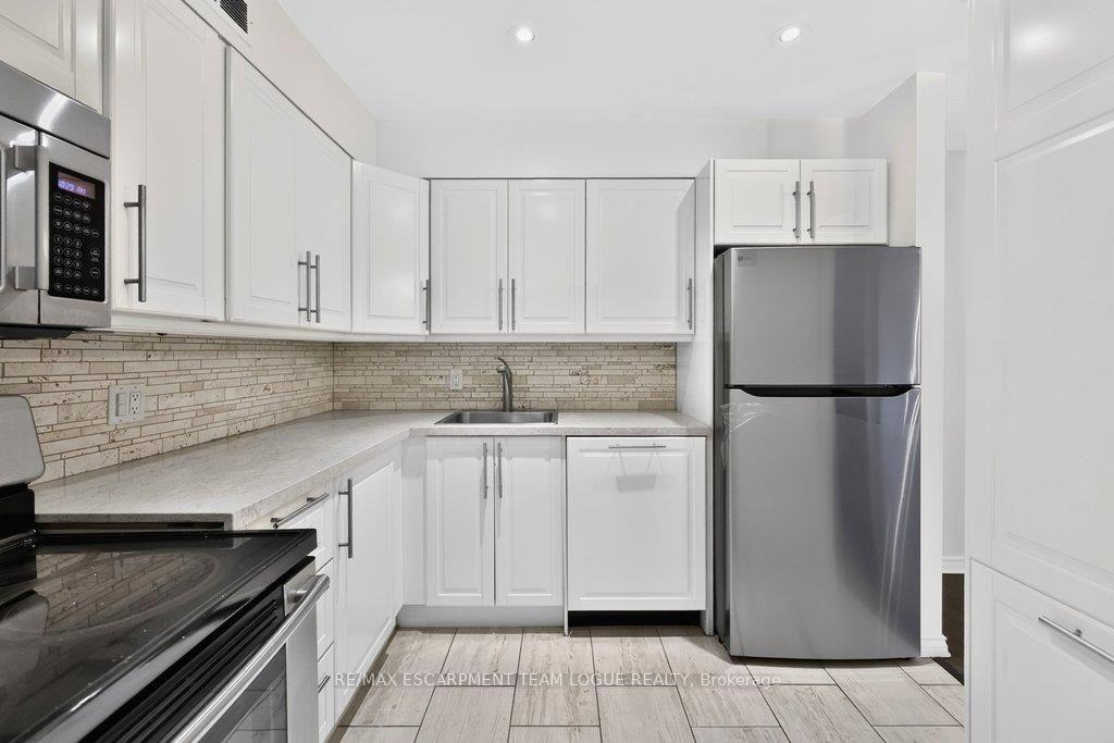 Photo 11 of Unit 1531, 1482 Pilgrims Way, Oakville, Glen Abbey — HOMEH