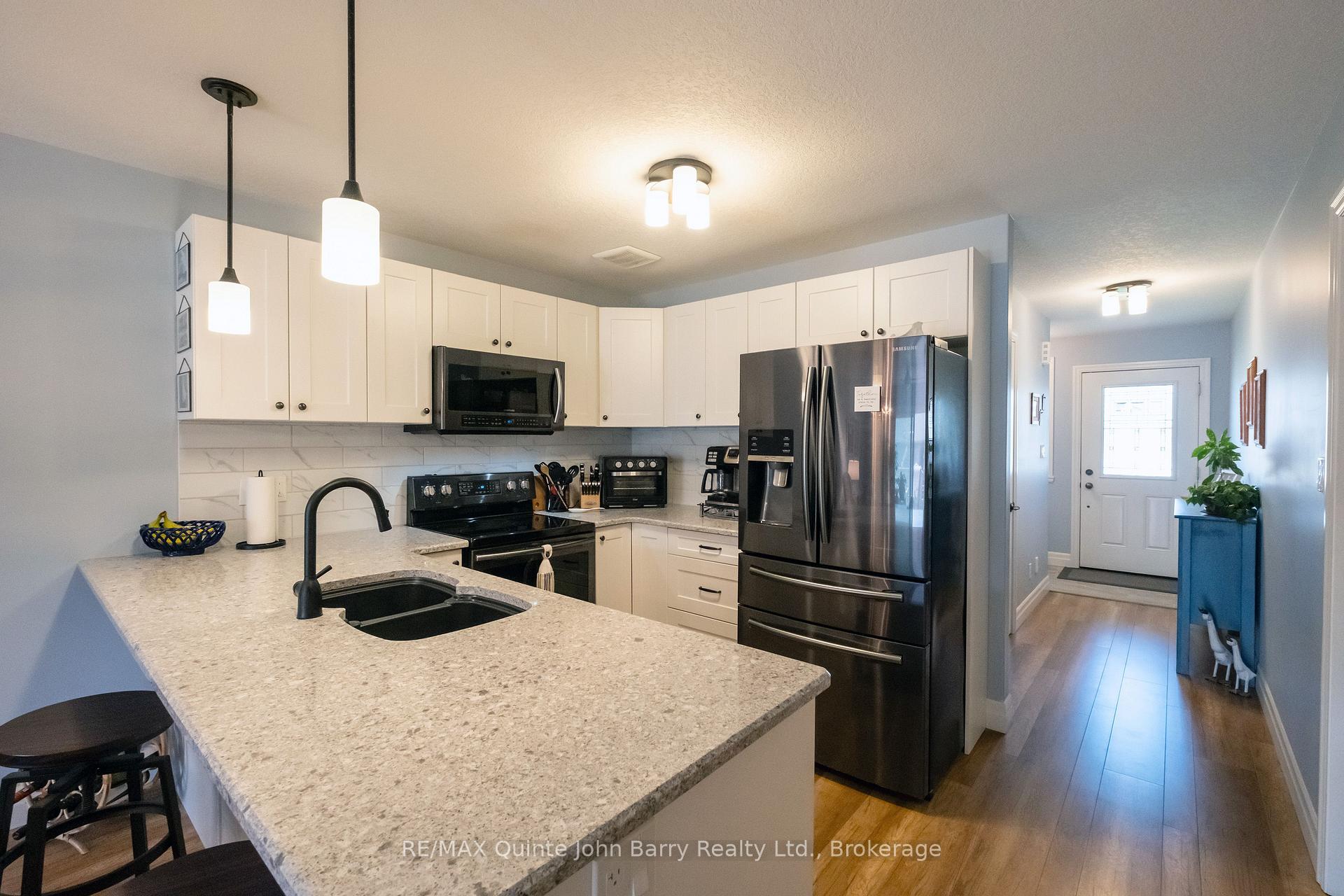 Photo 5 of 49 McIntosh Crescent, Quinte West, Murray Ward — HOMEH