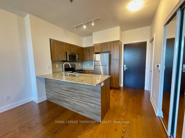 Photo 4 of Unit 323, 65 Speers Road, Oakville, Central — HOMEH