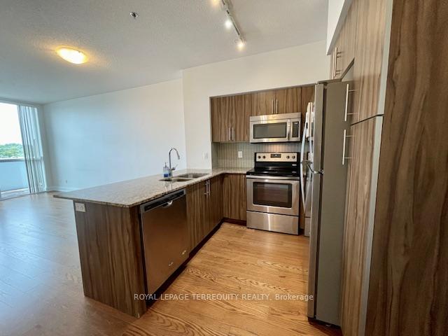 Photo 8 of Unit 323, 65 Speers Road, Oakville, Central — HOMEH