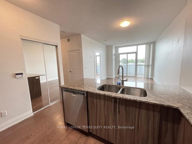 Photo 9 of Unit 323, 65 Speers Road, Oakville, Central — HOMEH